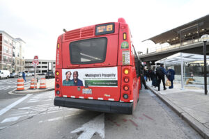 Washington's Prosperity advertisement on back of Washington DC bus